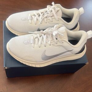 Nike White and Black Athletic Shoes with Silver Metallic Logo. Size 7.5.